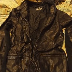 leather jacket for small petite lady ..has zippers on sleeves and pockets